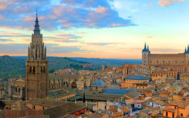 A view of the city from above, with many buildings.